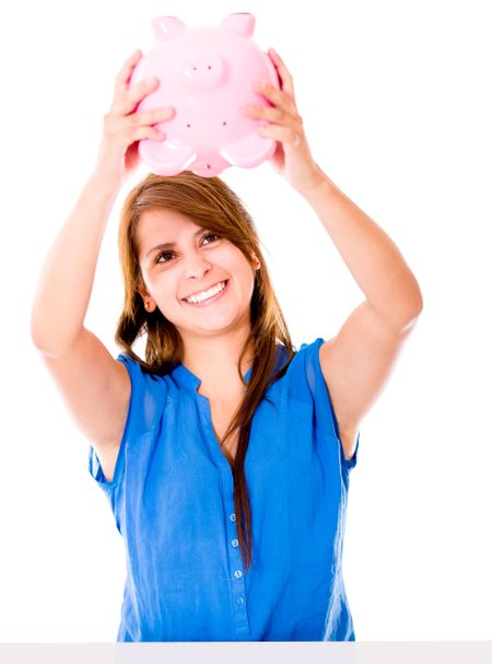 Woman using her piggybank savings - isolated over a white background