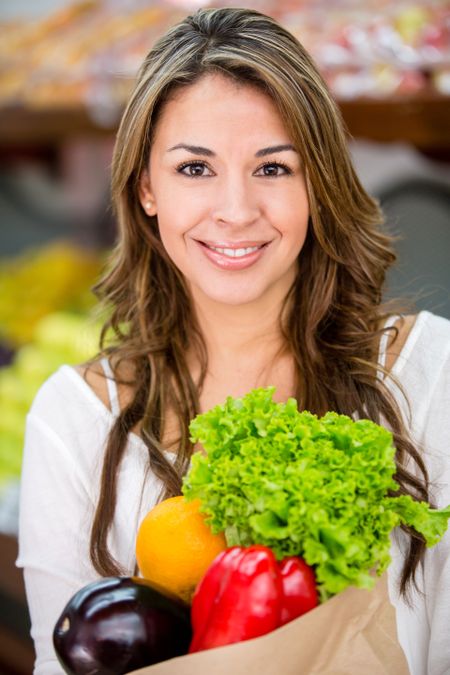 Healthy female shopping buying fresh groceries