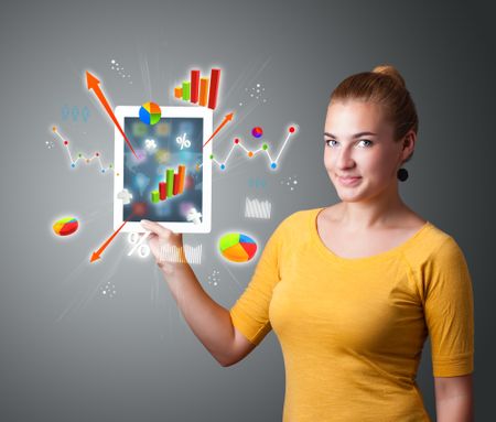 beutiful woman holding modern tablet with colorful diagrams and graphs