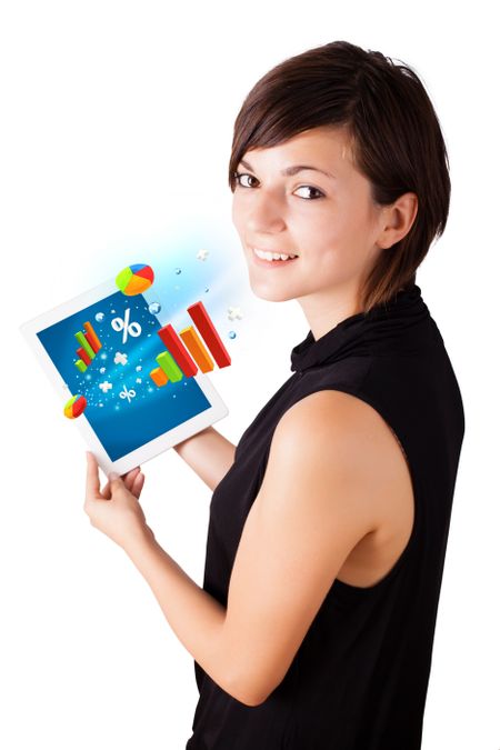 Young business woman looking at modern tablet with colourful diagrams