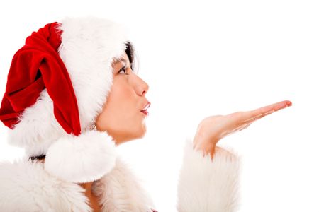 Mrs Claus blowing Christmas kisses - isolated over a white background