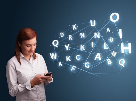 Beautiful young woman typing on smartphone with high tech 3d letters comming out