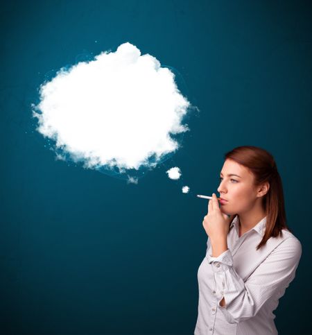 Pretty young woman smoking unhealthy cigarette with dense smoke