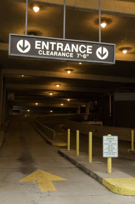 Entrance to parking garage -- daytime view from public sidewalk