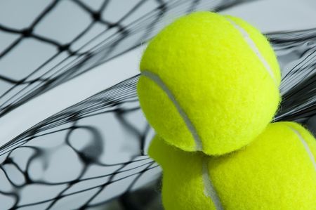 Tennis ball and net with distorted reflections
