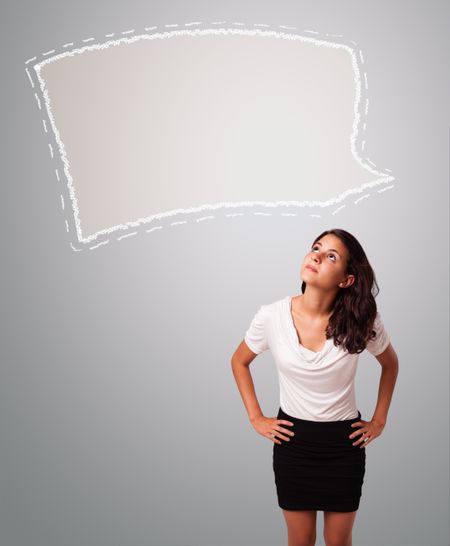Attractive young woman looking abstract speech bubble copy space