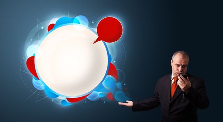 crazy businessman in suite holding a phone and presenting abstract modern speech bubble with copy space