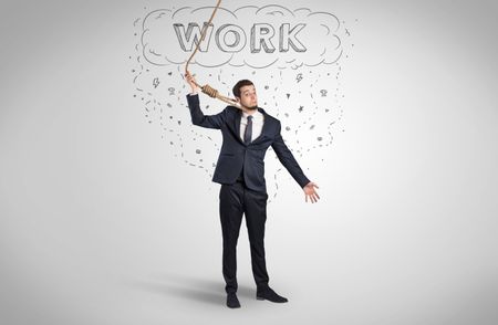 Young desperate businessman with suicide rope concept