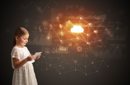 Adorable girl working on tablet with cloud technology concept