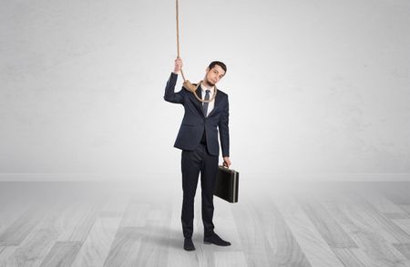 Young responsable man on the verge of suicide