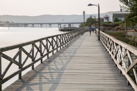 Riverside Pier Walk in Galicia, Spain