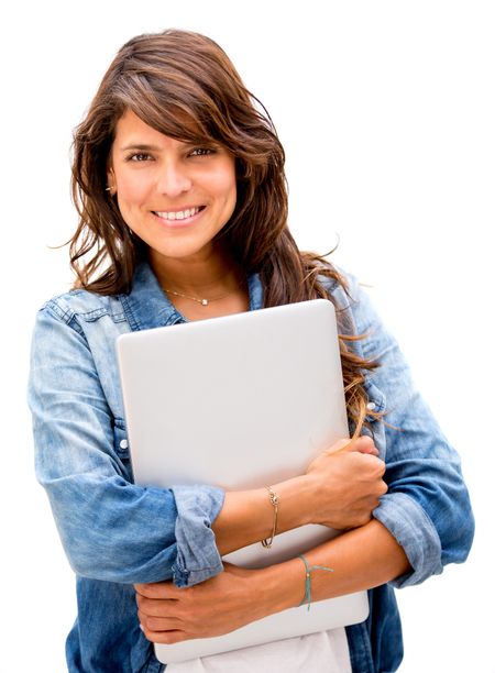 Casual woman holding a laptop - isolated over a white background