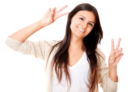 Fun woman making a peace sign - isolated over white