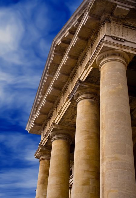 columns of justice over blue sky