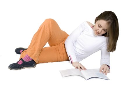 beautiful woman reading on the floor over a white background
