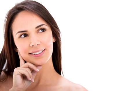 Beautiful thoughtful woman - isolated over a white background