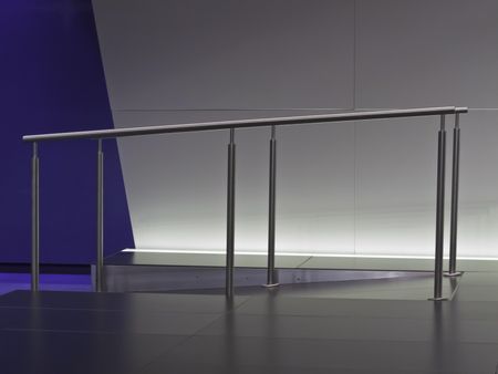 Wheelchair-accessible ramp with steel railings at auto show