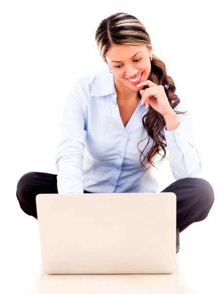 Businesswoman working online on a laptop - isolated over white