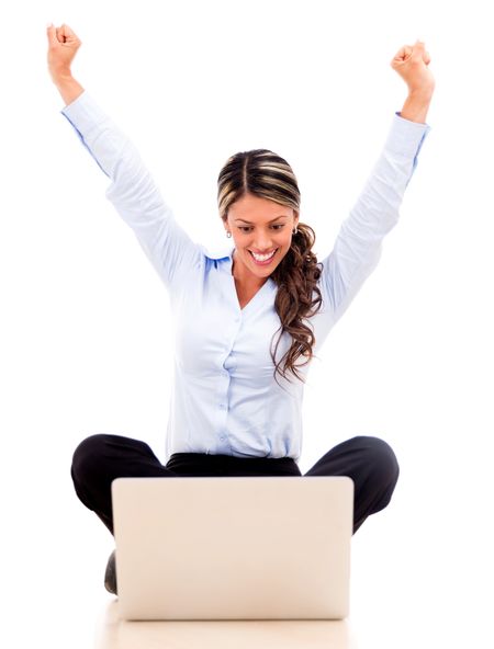Business woman enjoying her online success - isolated over white