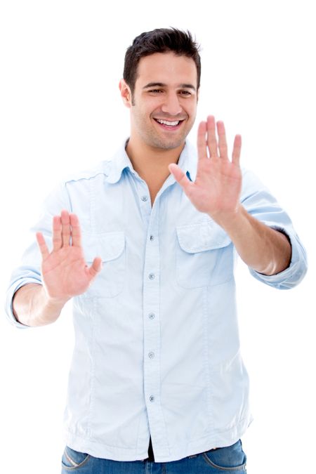 Man touching something imaginary - isolated over a white background
