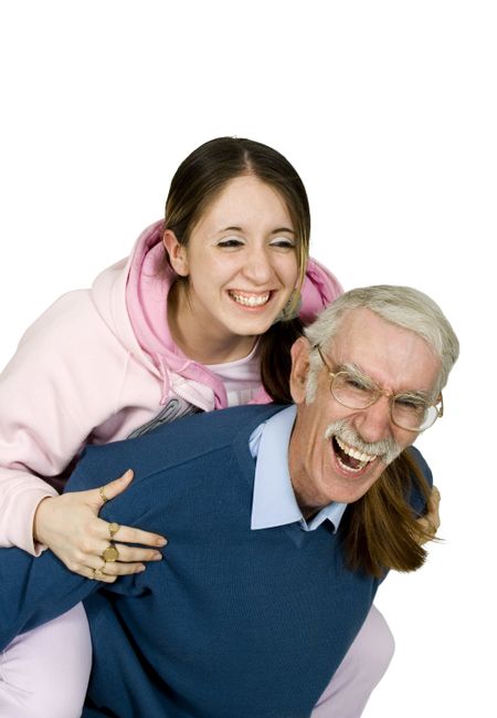 girl and her father having fun, shot over white in studio