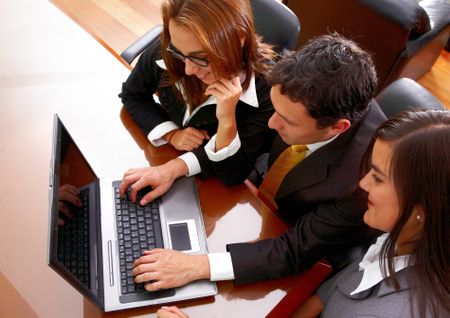 businessmen-businesswomen-business-meeting-office-smiling-12944737 businessmen and businesswomen in a business meeting in an office smiling