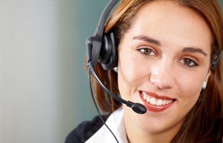 beautiful business customer service woman - smiling in an office