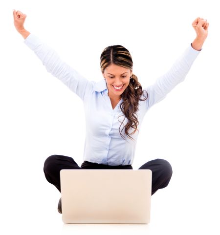 Excited business woman with arms up - isolated over white