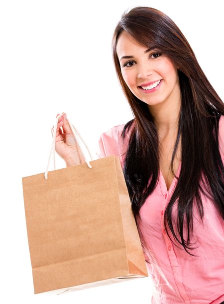 Happy woman with a shopping bag - isolated over a white background
