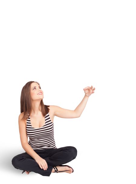 Beautiful young lady gesturing with copy space
