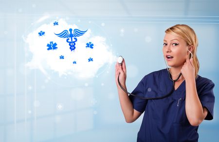 Beautiful young doctor with abstract cloud and medical icons