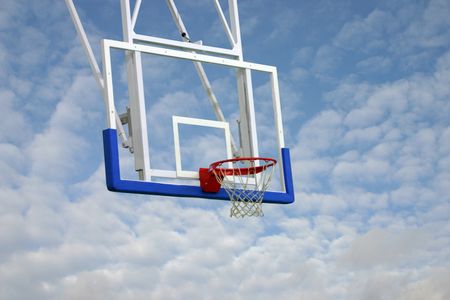 Basketball hoop with a sky in the background