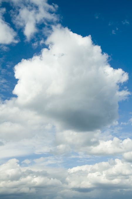 Cumulus clouds and blue sky before a storm