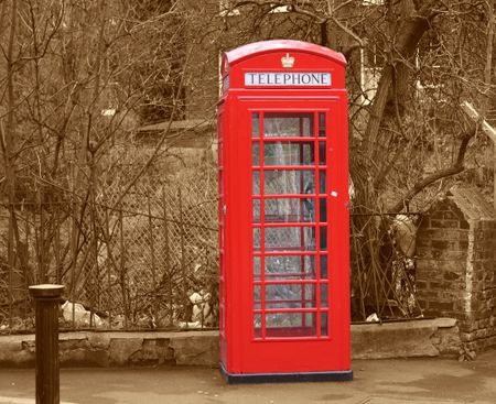 Red phone box in London standing out from the background