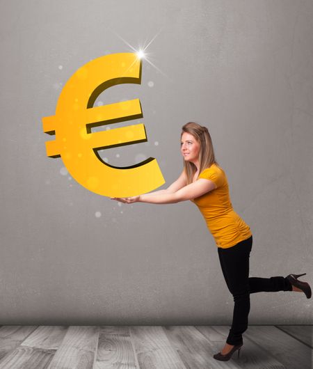 Beautiful young girl holding a big 3d gold euro sign