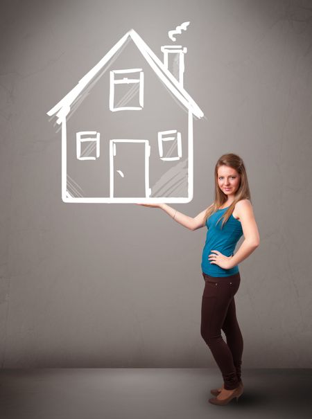 Beautiful young lady holding a huge drawn house