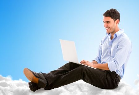 Business man working online from the cloud on his laptop
