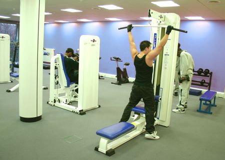 Gym environment with teenagers using the facilities