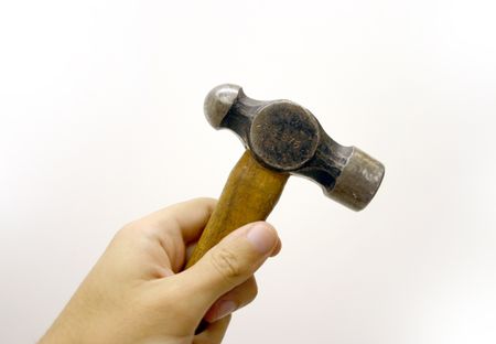 Hammer being held by a hand