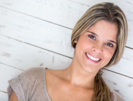 portrait-beautiful-casual-woman-smiling-134434880 Portrait of a beautiful casual woman smiling