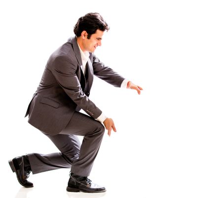 Business man holding something with his hands - isolated over white