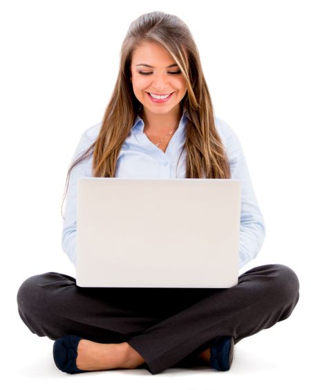 Business woman working online from a laptop - isolated over white