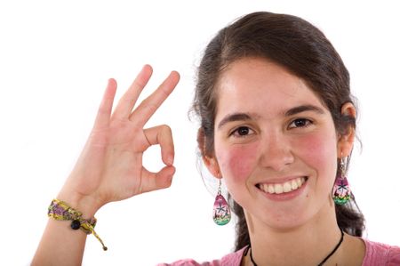 casual woman smiling doing the ok sign isolated over a white background