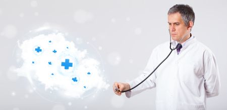 Proffesional doctor listening to abstract cloud with medical signs