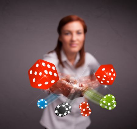 Pretty young woman throwing dices and chips