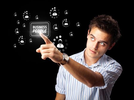 Businessman pressing business type of modern buttons with virtual background