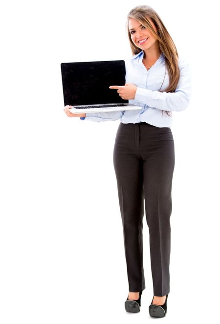 Business woman holding a laptop and showing the screen. Isolated over white