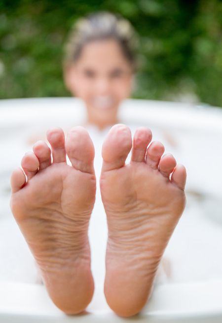 Beautiful woman taking bath after a long day