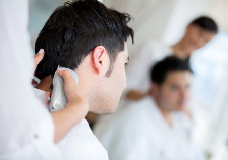 Man at the hairdresser getting a haircut