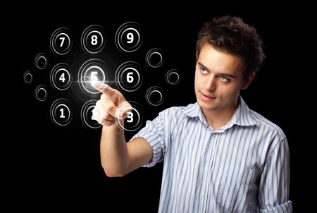 Businessman pressing high tech type of modern buttons on a virtual background